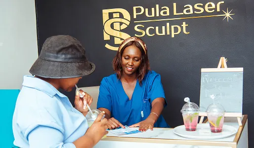 Pula Laser Sculpt Beauty Therapist assisting client